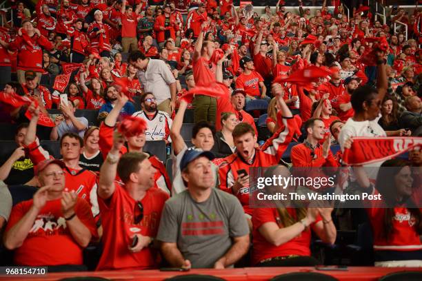 The Washington Capitals hold a free viewing party during which fans can watch the game on the jumbotron at the Capital One Arena in Washington, D.C.,...