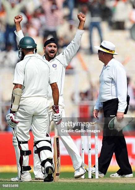 Harbhajan Singh of India celebrates the wicket of Ashwell Prince of South Africa for 23 runs during day five of the Second Test match between India...