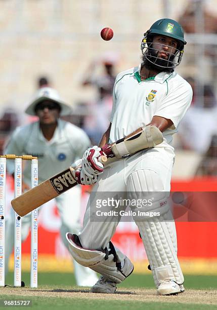 Hashim Amla of South Africa evades a bouncer during day five of the Second Test match between India and South Africa at Eden Gardens on February 18,...