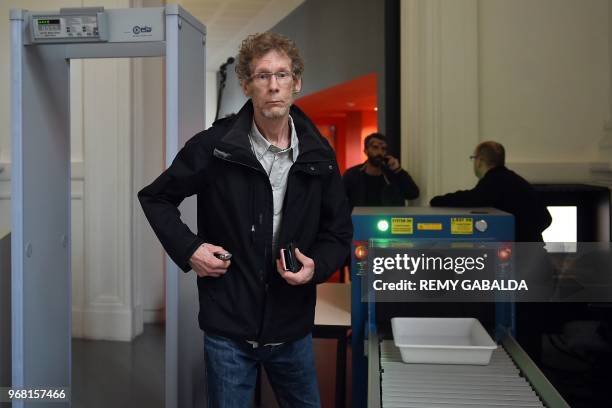 Gilles Bertin, who took part in the robbery of a Brink's storage in April 1988 in Toulouse, arrives at the Criminal court of Toulouse, southwestern...