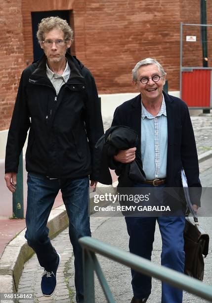 Gilles Bertin , who took part in the robbery of a Brink's storage in April 1988 in Toulouse, and his lawyer Christian Etelin, walk towards the...