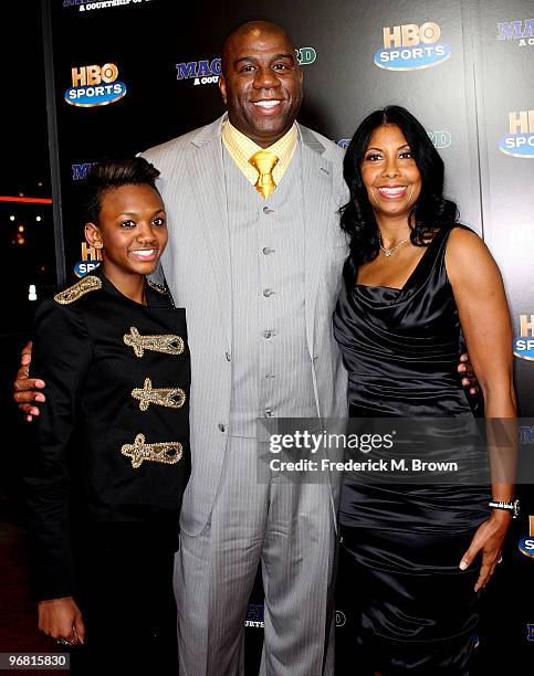 Earvin "Magic" Johnson, his wife Cookie Johnson and daughter Elisa Johnson attend the "Magic & Bird: A Courtship of Rivals" film premiere at the Mann...