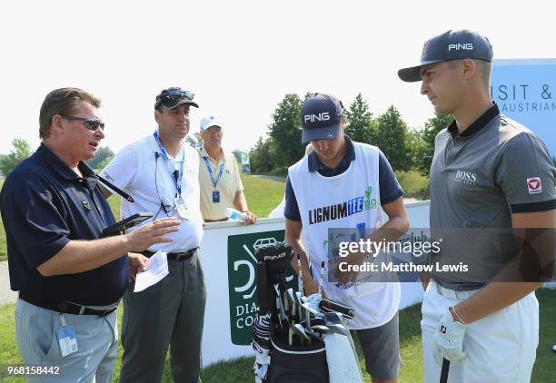 Referee explains the 'Shot Clock' system to Matthias Schwab of Austria on the 18th hole during the Pro-Am of The 2018 Shot Clock Masters at Diamond...