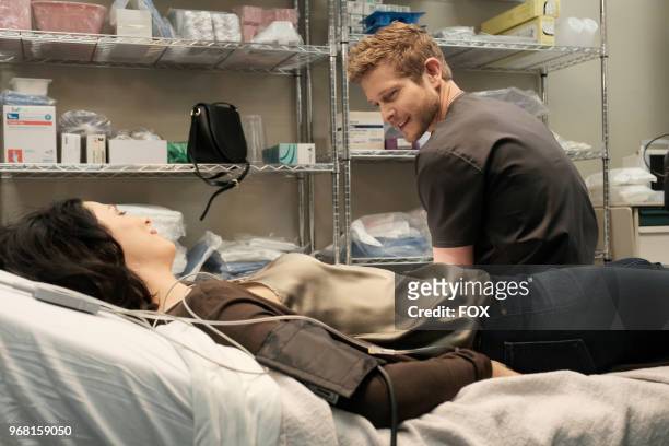Guest star Joanne Kelly and Matt Czuchry in the "Lost Love" episode of THE RESIDENT airing Monday, March 26 on FOX.
