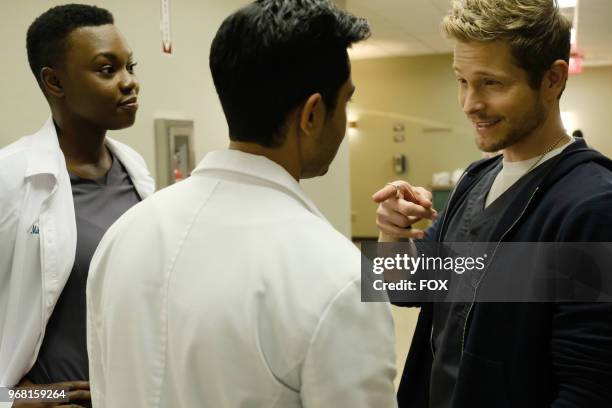 Shaunette Renée Wilson, Manish Dayal and Matt Czuchry in the "Rude Awakenings and The Raptor" episode of THE RESIDENT airing Monday, April 30 on FOX.