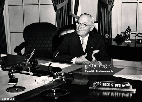 Truman sitting in Library