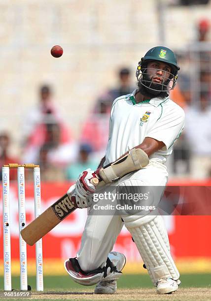 Hashim Amla of South Africa evades a bouncer during day five of the Second Test match between India and South Africa at Eden Gardens on February 18,...