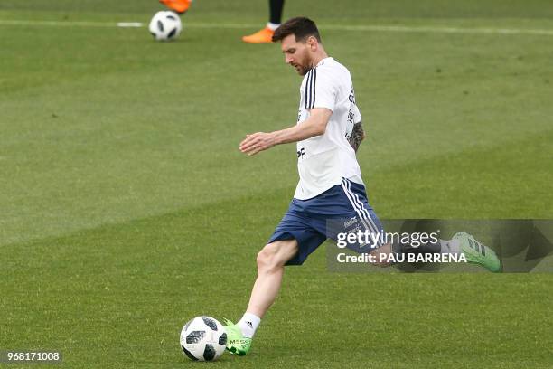 Argentina's forward Lionel Messi attends a training session at the FC Barcelona 'Joan Gamper' sports center in Sant Joan Despi, near Barcelona, on...