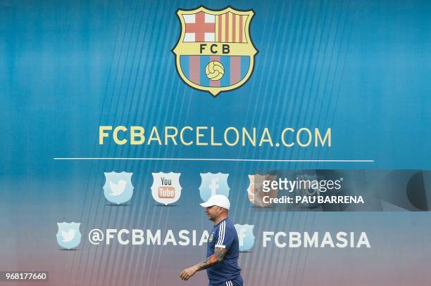 Argentina's coach Jorge Sampaoli arrives for a training session at the FC Barcelona 'Joan Gamper' sports center in Sant Joan Despi, near Barcelona,...