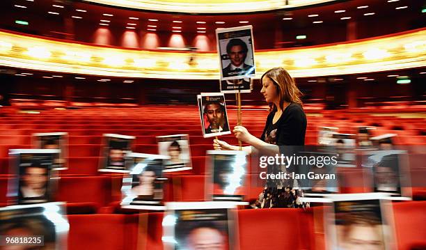 Royal Opera House staff prepare celebrity seating arrangements in preparation for the BAFTA ceremony at the Royal Opera House on February 18, 2010 in...