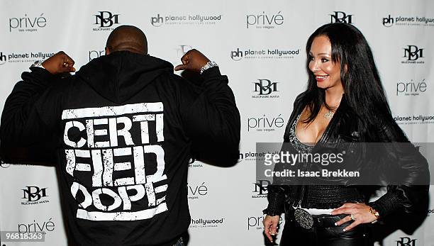 Founder and designer Lana Fuchs and Jadakiss arrive at the Billionaire Mafia Legend launch party at Prive on February 17, 2010 in Las Vegas, Nevada.