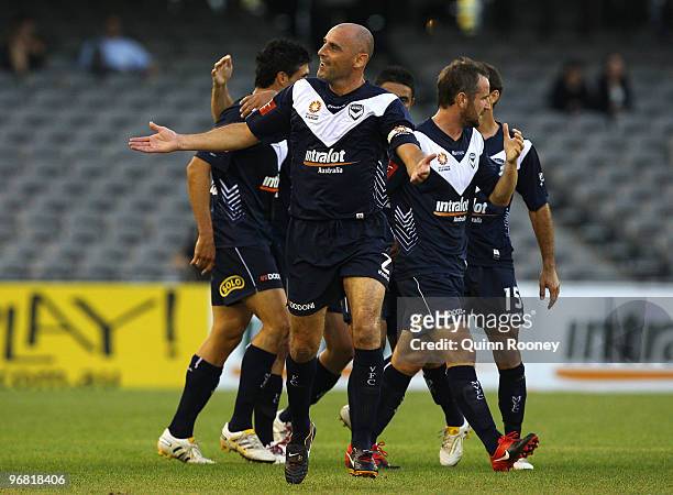 Kevin Muscat of the Victory celebrates a goal by Nik Mrdja during the A-League Major Semi Final first leg match between the Melbourne Victory and...
