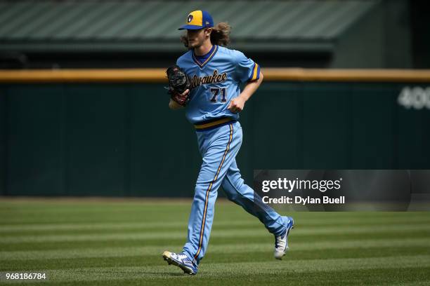 Josh Hader of the Milwaukee Brewers jogs across the field in the sixth inning against the Chicago White Sox at Guaranteed Rate Field on June 2, 2018...