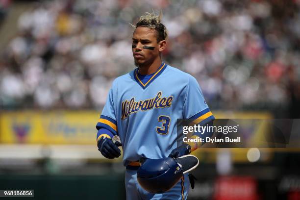 Orlando Arcia of the Milwaukee Brewers walks across the field after flying out in the seventh inning against the Chicago White Sox at Guaranteed Rate...