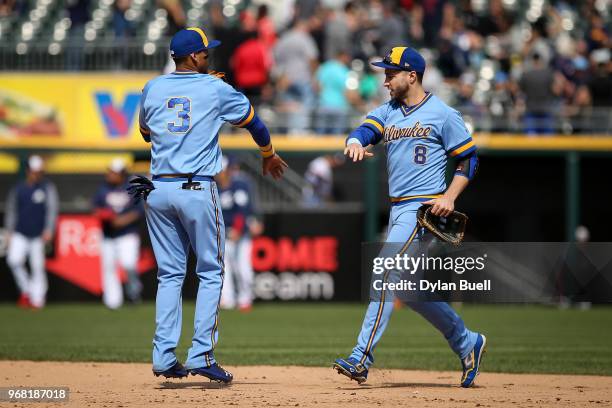 Orlando Arcia and Ryan Braun of the Milwaukee Brewers celebrate after beating the Chicago White Sox 5-0 at Guaranteed Rate Field on June 2, 2018 in...