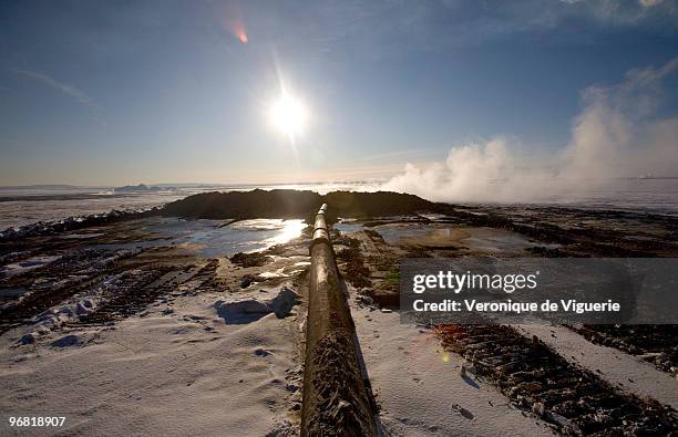 Once the oil is extracted from the tar sand, the remains travel through a pipe to a tailing pond. The tailing ponds are highly criticised by...