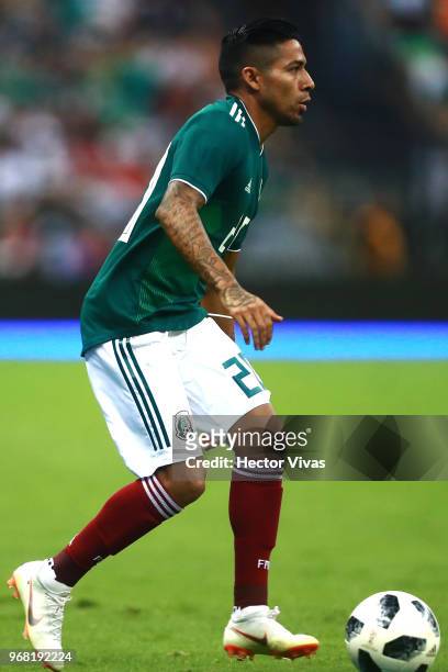 Javier Aquino of Mexico drives the ball during the International Friendly match between Mexico v Scotland at Estadio Azteca on June 2, 2018 in Mexico...