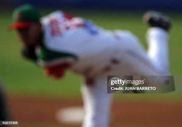 Mexican Hector Rodriguez of Naranjero de Hermosillo pitches before a Caribbean Series match against Leones de Escojido of Dominican Republic at...