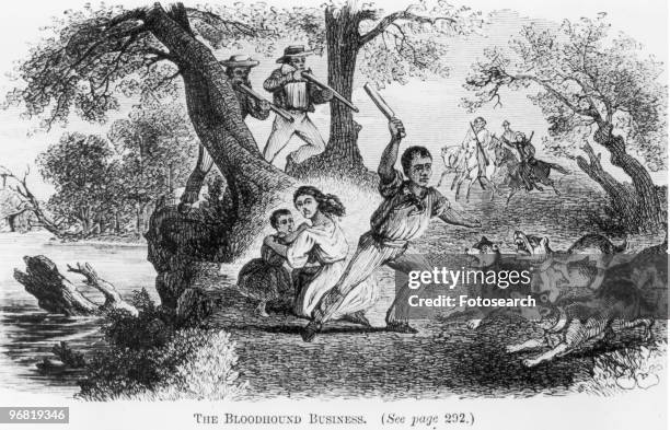 An Engraving of a Runaway Slave Protecting his Family from Bloodhounds, circa 1860. Text 'The Bloodhound Business'