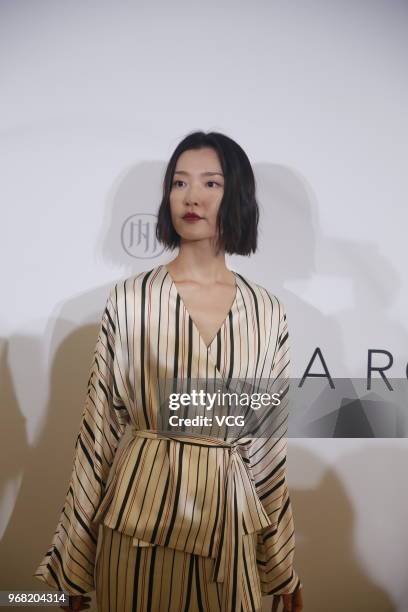 Fashion model Du Juan attends a commercial event on June 5, 2018 in Shanghai, China.