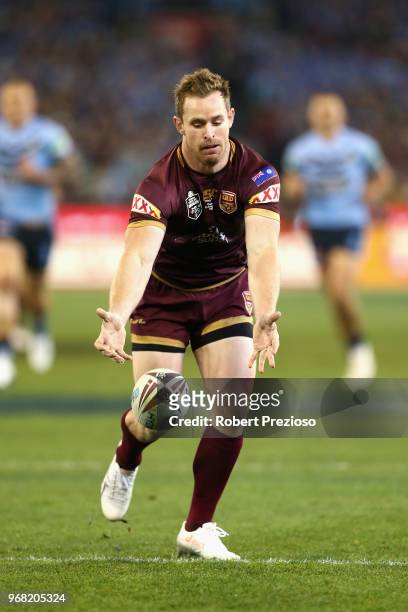 Michael Morgan of the Maroons fumbles a high ball during game one of the State Of Origin series between the Queensland Maroons and the New South...