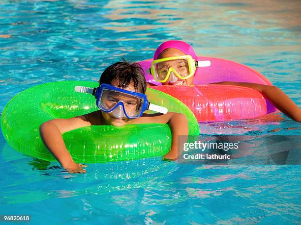 9,552 Kid Floating In Water Stock Photos, High-Res Pictures, and Images ...