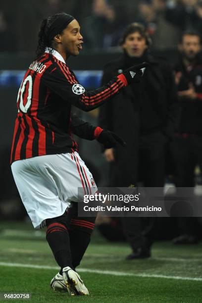 Ronaldinho of AC Milan celebrates the opening goal during the UEFA Champions League round of 16 first leg match between AC Milan and Manchester...