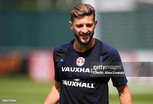 Adam Lallana of England looks on during the England training session at St Georges Park on June 6, 2018 in Burton-upon-Trent, England.