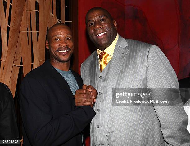 Former Los Angeles Lakers Byron Scott and Earvin "Magic" Johnson attend the "Magic & Bird: A Courtship of Rivals" film premiere after party at the...