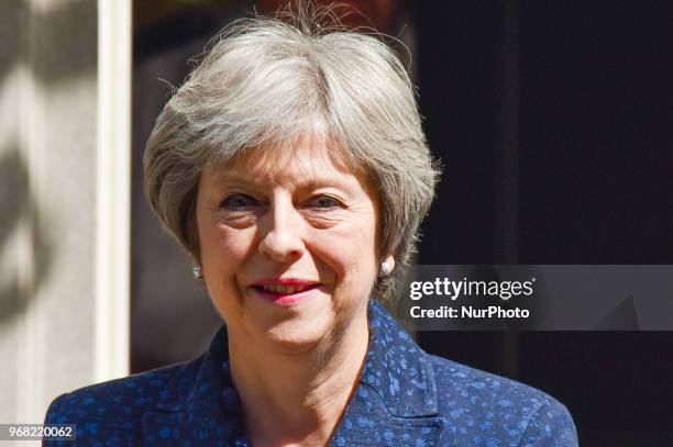 British Prime Minister Theresa May leaves 10 Downing Street as she makes her way to the Parliament to attend Prime Minister Question session , London...