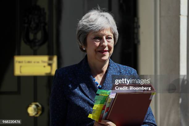 Theresa May, U.K. Primer minister, departs number 10 Downing Street to attend a weekly questions and answers session in Parliament in London, U.K.,...