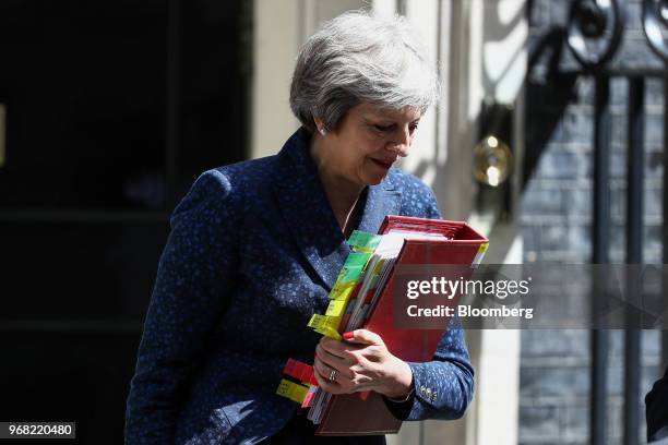 Theresa May, U.K. Primer minister, departs number 10 Downing Street to attend a weekly questions and answers session in Parliament in London, U.K.,...