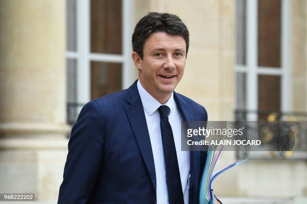 French Government's Spokesperson Benjamin Griveaux leaves the Elysee Presidential Palace after attending the weekly cabinet meeting in Paris on June...