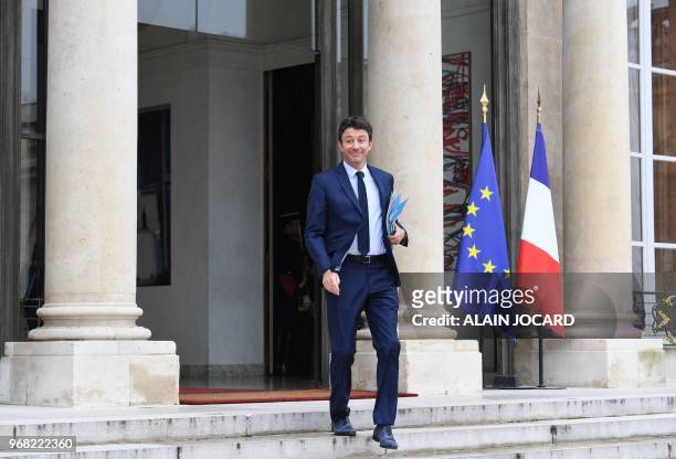 French Government's Spokesperson Benjamin Griveaux leaves the Elysee Presidential Palace after attending the weekly cabinet meeting in Paris on June...