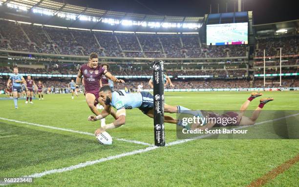 General view as Josh Addo-Carr of the Blues scores a try during game one of the State Of Origin series between the Queensland Maroons and the New...