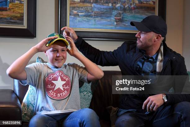 Year-old Leo Sadler meets his role model AB de Villiers at his home during an arranged surprise meeting on June 05, 2018 in Pretoria, South Africa....