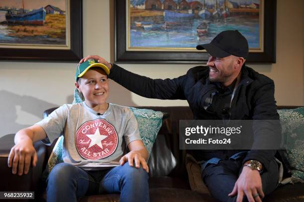 Year-old Leo Sadler meets his role model AB de Villiers at his home during an arranged surprise meeting on June 05, 2018 in Pretoria, South Africa....