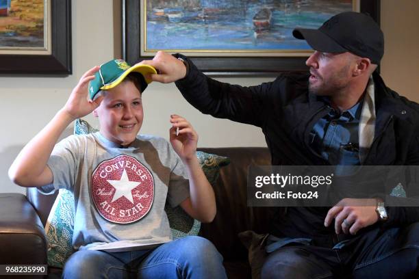 Year-old Leo Sadler meets his role model AB de Villiers at his home during an arranged surprise meeting on June 05, 2018 in Pretoria, South Africa....