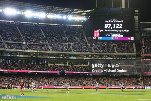 The crowd total is shown on screen during game one of the State Of Origin series between the Queensland Maroons and the New South Wales Blues at the...