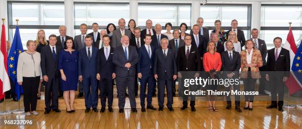 Commission and the Austrian government are posing for a family photo during a visit in the Berlaymont, the EU Commission headquarters on June 6 2018,...
