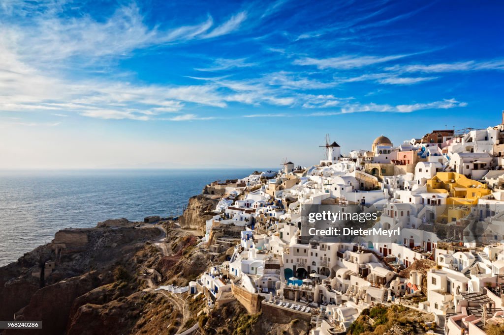 Oia village in Santorini island with famous churches, Greece