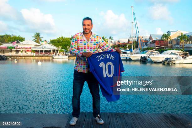 Bruno Michaux-Vignes, football fan in Guadeloupe, poses on April 19, 2018 in The Marina in Pointe-a-Pitre, Guadeloupe, French west Indies. - In...