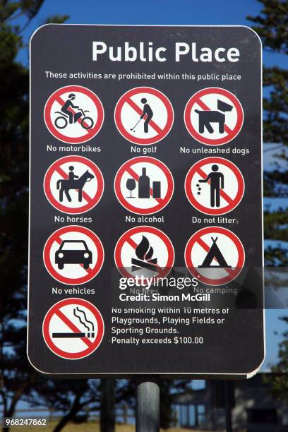 public place sign shows activities prohibited within a public park - australia fires horse stock pictures, royalty-free photos & images