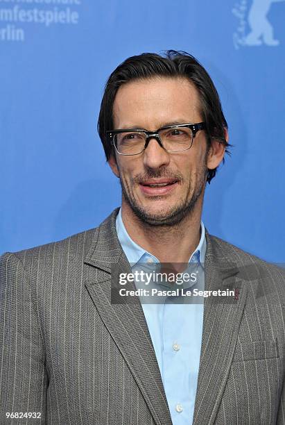 Director Oskar Roehler attends the 'Jud Suess Film Ohne Gewissen' Photocall during day eight of the 60th Berlin International Film Festival at the...