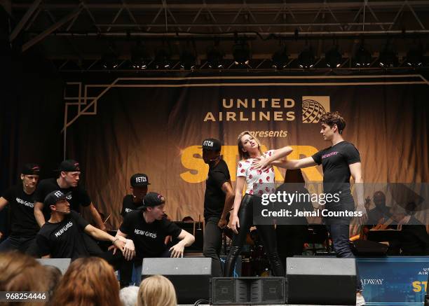 Taylor Louderman, Kyle Selig and ensemble members from "Mean Girls" perform at the United Airlines Presents: #StarsInTheAlley produced by The...