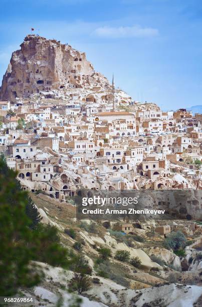 goreme town with mosque and residences in rock formations, cappadocia region, turkey - arman zhenikeyev fotografías e imágenes de stock