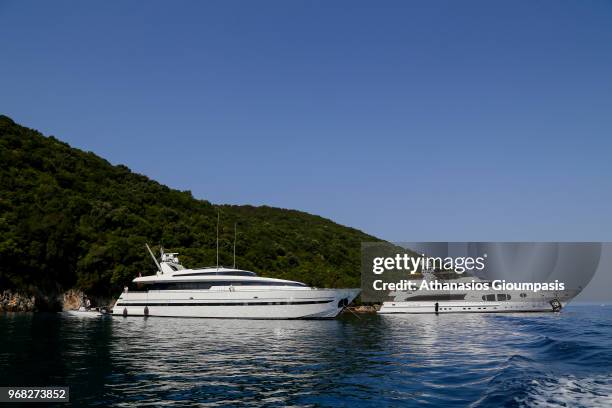 Moored yacht at Pissina beach on August 03, 2015 in Sivota, Greece. Piscina beach located on Agios NIkolaos island with incredibly clear and calm...
