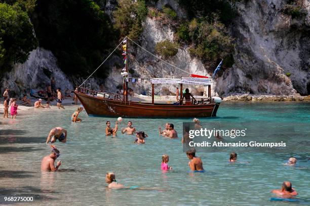 The Pissina beach on August 06, 2015 in Sivota, Greece. Piscina beach located on Agios NIkolaos island with incredibly clear and calm waters and is...
