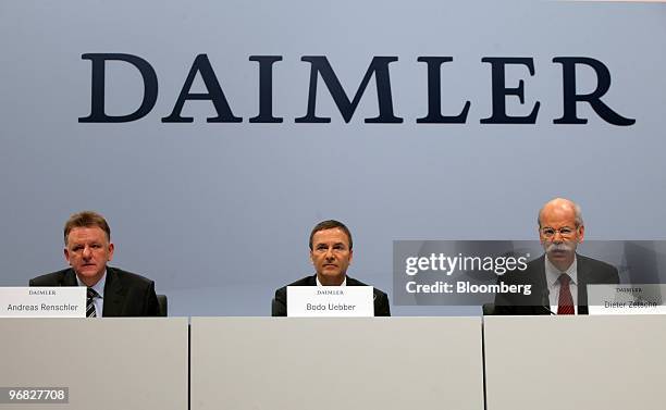 Andreas Renschler, head of Daimler AG's truck unit, left, Bodo Uebber, chief financial officer of Daimler AG, center, and Dieter Zetsche, chief...