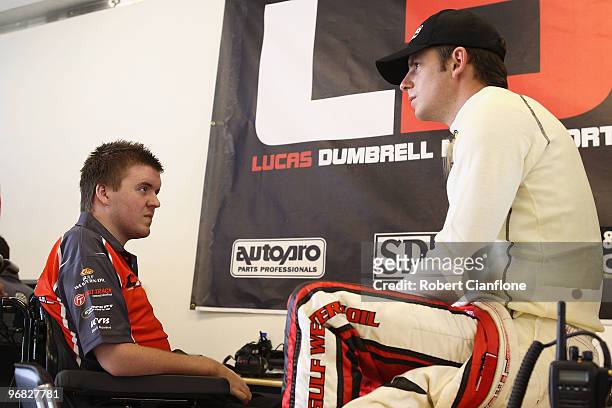 Lucas Dumbrell owner of Lucas Dumbrell Motorsport talks with driver Daniel Gaunt prior to practice for round one of the V8 Supercar Championship...